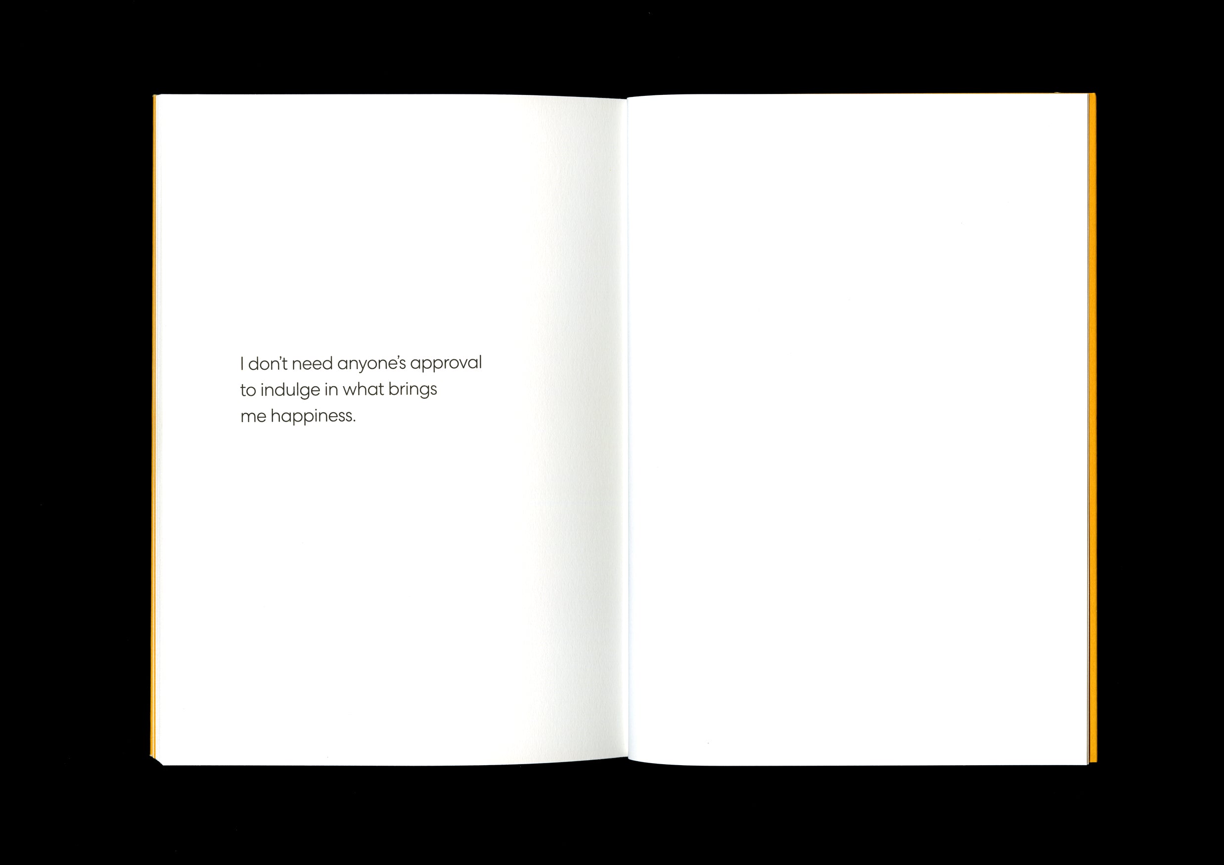 Affirmation page with the words, “I don’t need anyone’s approval to indulge in what brings me happiness,” printed in black on a white background.